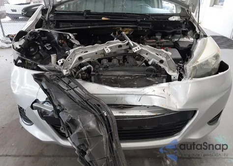 2012 Toyota Yaris Le z USA, uszkodzony, nr VIN JTDKTUD38CD508791